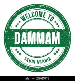 WELCOME TO DAMMAM - SAUDI ARABIA, words written on green round coin stamp Stock Photo