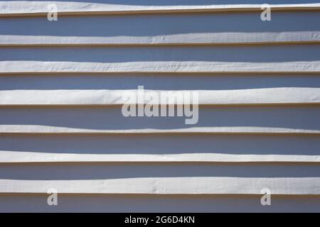 White painted wooden shiplap boards Stock Photo