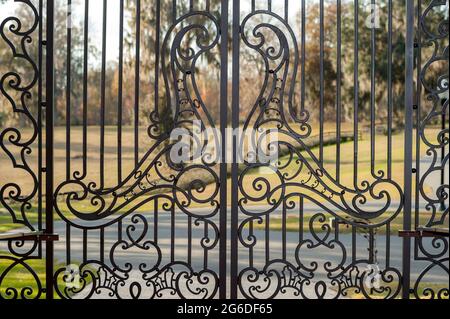 non forged aluminum decorative metalwork on driveway entry gates. Stock Photo