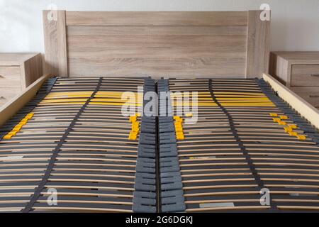 Slatted base, wooden element double bed frame close up in bedroom orthopedic Stock Photo