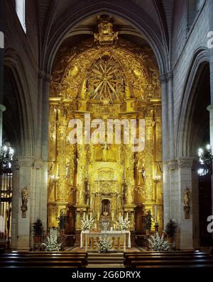 Spain, Community of Madrid, Torrelaguna. Church of Santa Maria Magdalena. Declared a Historic-Artistic Monument. General view of the altarpiece of the main altar, attributed to Narciso Tomé (1690-1742) in the 18th century, gilded by Bernardo Mortolas. In the central section of the altarpiece, a niche holds the sculpture of the patron saint of the church, the penitent Mary Magdalene, made by Luis Salvador Carmona (1708-1767) in the second third of the 18th century. Stock Photo