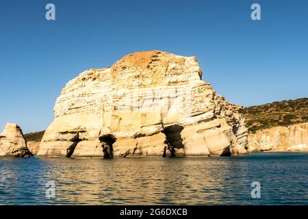 Peculiar Kleftiko limestone sea rocks formations on the southwest coast of Milos Island, with a labyrinth of caves, symbol of the island. Stock Photo