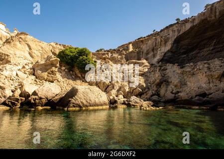 Kleftiko - collapsed rocks forming hidden cave due to volcanic activity, on the southwest coast of Milos Island, Greece. Stock Photo