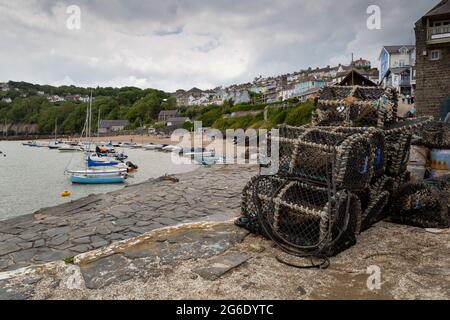 Editorial New Quay, UK - June 27, 2021:  New Quay fishing village on the West Wales coast in the UK, now a magnet for holiday makers. Stock Photo