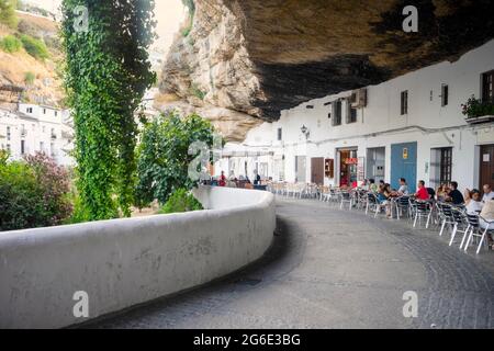 White washed houses built under the rock in Setenil de las Bodegas, Andalucia, Spain Stock Photo