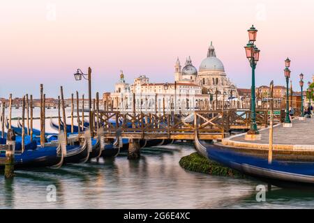 Basilica di Santa Maria della Salute, gondolas on the footbridge, Venice, Veneto, Italy Stock Photo