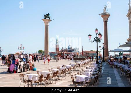 Columns with Marcus Lion, St. Mark's Square Restaurant, Venice, Veneto, Italy Stock Photo