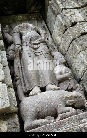 Decapitated sculpture of Durga at the temple of Selogriyo, Java Island, Indonesia Stock Photo
