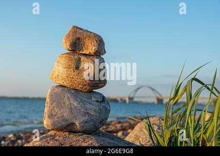 Cairn, Fehmarnsund Bridge, Grossenbrode Weststrand, Schleswig-Holstein, Germany Stock Photo