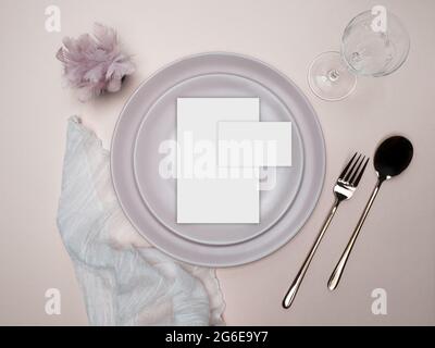 Table place and menu mockup. Wedding dinner design. Birthday table setting. Overhead view. Stock Photo