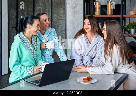 Businesswomen hold meeting in an informal setting. Stock Photo