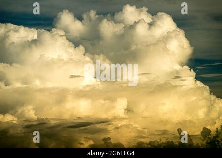 Cumulonimbus and altostratus clouds seen from a passenger jet above the South China Sea Stock Photo