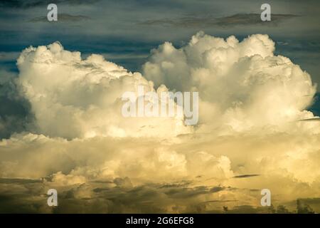 Cumulonimbus and altostratus clouds seen from a passenger jet above the South China Sea Stock Photo