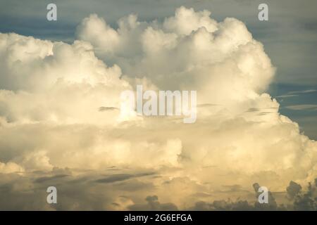 Cumulonimbus and altostratus clouds seen from a passenger jet above the South China Sea Stock Photo
