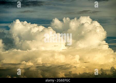 Cumulonimbus and altostratus clouds seen from a passenger jet above the South China Sea Stock Photo