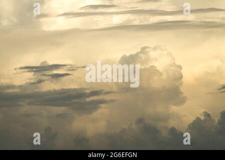 Cumulonimbus and altostratus clouds seen from a passenger jet above the South China Sea Stock Photo