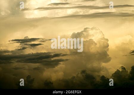 Cumulonimbus and altostratus clouds seen from a passenger jet above the South China Sea Stock Photo