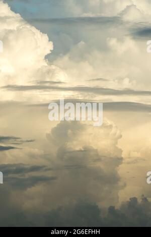 Cumulonimbus and altostratus clouds seen from a passenger jet above the South China Sea Stock Photo