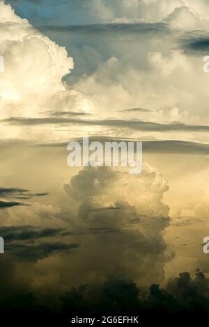 Cumulonimbus and altostratus clouds seen from a passenger jet above the South China Sea Stock Photo