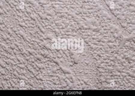 Light background. Abstract texture of vinyl wallpaper on the wall Stock Photo