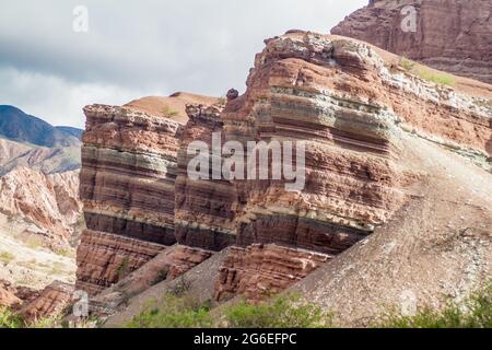 Colorful layered rock formations in Quebrada de Cafayate valley, Argentina. National park Quebrada de las Conchas. Stock Photo