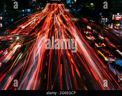 Traffic light trails during traffic jam on Ratchadamri Road, Bangkok, Thailand Stock Photo