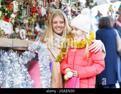 Family shopping on Christmas market Stock Photo