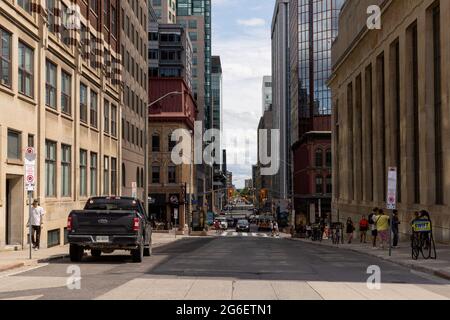 Ottawa, Canada - July 1, 2021: Cityscape street view with walking people in downtown of Ottawa. Stock Photo