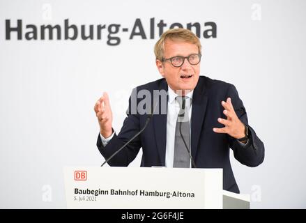 Hamburg, Germany. 05th July, 2021. Ronald Pofalla, Deutsche Bahn Board Member for Infrastructure, speaks during the event to mark the start of construction of the new Hamburg-Altona station. After several years of delay, construction work is starting in Hamburg on the new Altona long-distance station. It is being built at the current Diebsteich S-Bahn station and is scheduled to replace the Altona terminus station, which is located around two kilometres to the south, for long-distance and regional services in 2027. Credit: Daniel Reinhardt/dpa/Alamy Live News Stock Photo