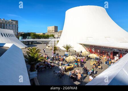 Outdoor terrace of La Colombe Niemeyer bar installed in the Espace Oscar Niemeyer, at the foot of the Volcan cultural center in Le Havre, France. Stock Photo