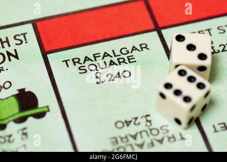 Close up of Trafalgar Square on a traditional Monopoly board. Stock Photo
