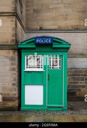 Vintage old disused green and white wooden police telephone box from 1929. Last remaining one in Sheffield South Yorkshire on Surrey Street. Original Stock Photo