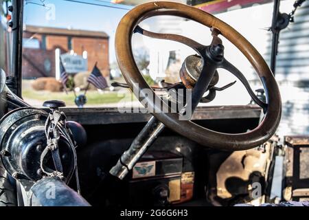 Steering wheel and dashboard of a vintage 1919 Ford Model T. Stock Photo