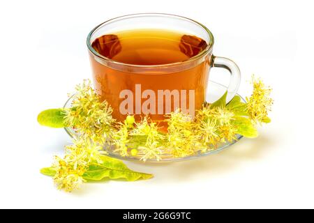 Cup of herbal tea with linden flowers isolated on white background. Stock Photo