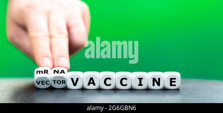 Symbol for a vaccination against covid 19 with two different vaccines. With a mRNA vaccine and a viral vector vaccine. Stock Photo