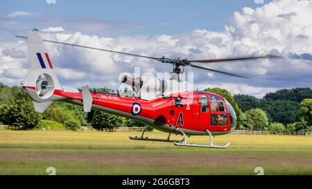 Gazelle Squadron Display Team - Westland Gazelle HT.3 (ZB627) airborne at Shuttleworth Military airshow on the 4th July 2021 Stock Photo