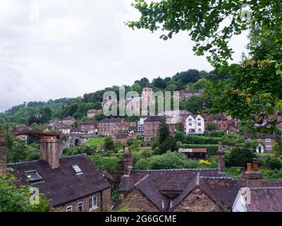 View across  historic town of Ironbridge with original Ironbridge over River Severn Shropshire England UK Stock Photo