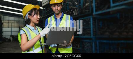 Two engineers worker check and working on laptop in industry planning and working concept Stock Photo