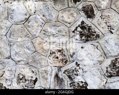 Stonewall. Wall made of stones. Garden wall. Stock Photo