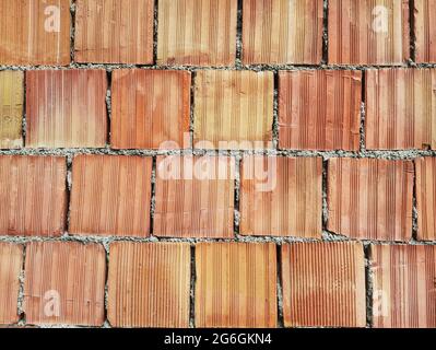 Red bricks. Brick wall. Garden wall. Stock Photo