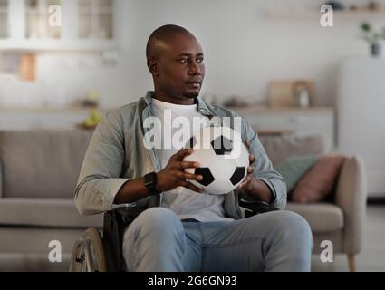 Loss, lonely, expression of sadness, sports injury and recovery at home Stock Photo