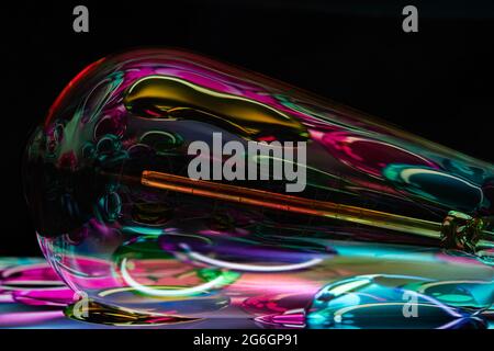 Colourful Wallpapers with Bulb and ipad Stock Photo