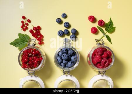 flat lay composition with fresh seasonal berries Stock Photo