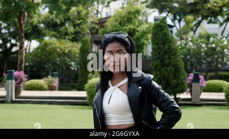 Facial Expressions Chinese Asian Girl Model Poser Actress Tourist Traveler in Park Bangkok Thailand Stock Photo