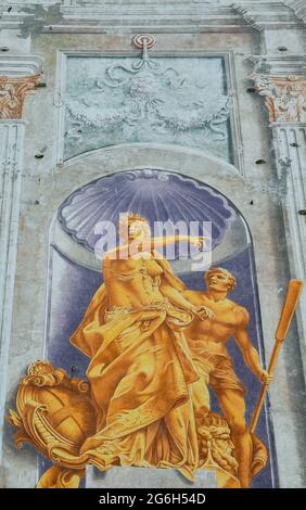 Close-up of the fresco of the northern façade of Palazzo San Giorgio with the representation of the genius of nautical, Genoa, Liguria, Italy Stock Photo