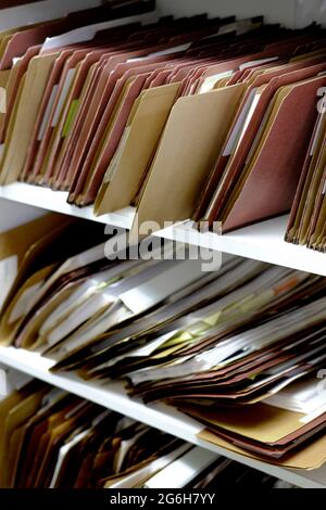 Files and folders on shelf business work for organizing papers Stock Photo