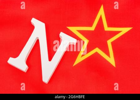 Wood N & Soviet style Red Star to form 'No'. For battle to teach CRT / Critical Race Theory is America's schools as parents push back. US and Marxism. Stock Photo