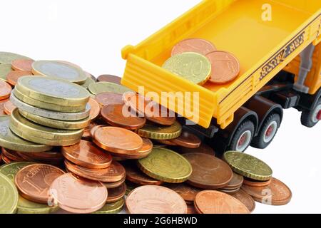 A pile of Euro coins from a dumper truck, forming a money mountain. Stock Photo