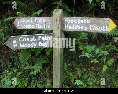 Combe Martin Heddons mouth Woody Bay direction trail sign. South west coast path. North Devon. West country. England. UK Stock Photo