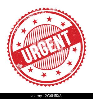 URGENT text written on red grungy zig zag borders round stamp. Stock Photo